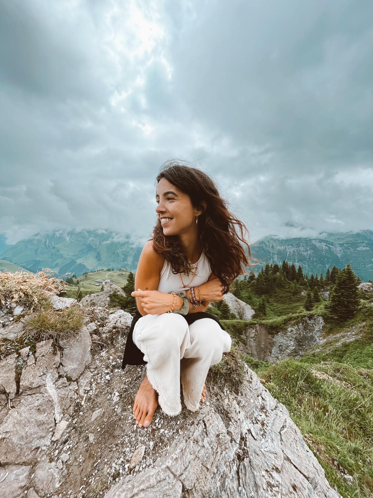 Inês on a mountain ridge